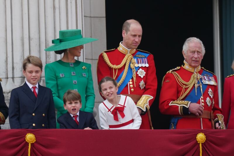 From left: Prince George, the Princess of Wales, Prince Louis, the Prince of Wales, Princess Charlotte and King Charles III on the balcony of Buckingham Palace. PA