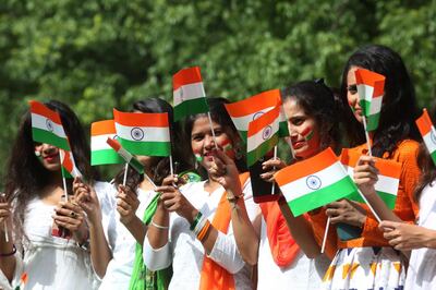 epa06947840 Indian girls with their faces painted with Indian flag colors, hold Indian flags as they celebrate ahead of India's Independence Day in Bhopal, India, 13 August 2018. India marks 71 years of independence from British rule on 15 August 2018.  EPA/SANJEEV GUPTA