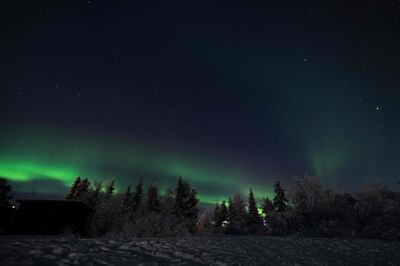 Northern lights (aurora borealis) illuminate the sky over the Arctic. AFP