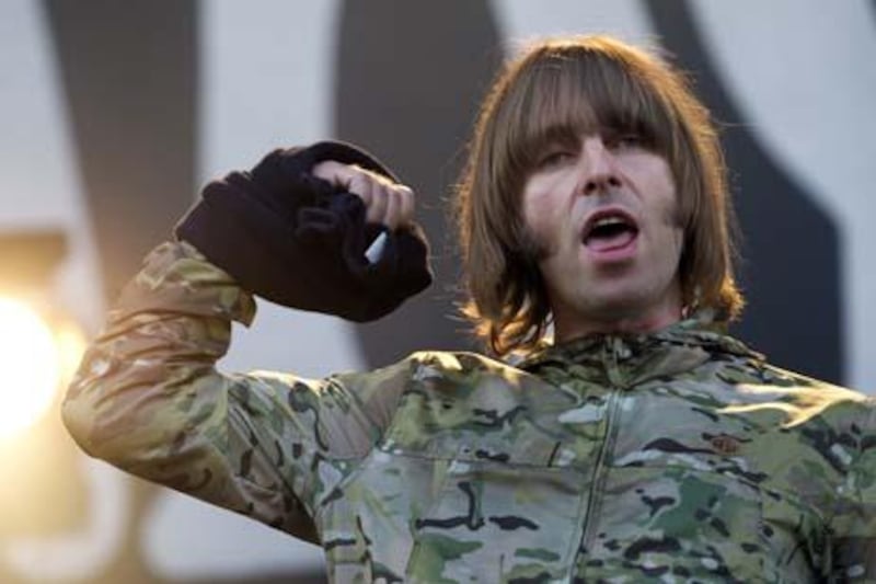 Beady Eye band's British singer Liam Gallagher performs on stage during a concert at the Eurockeennes music festival in Belfort, eastern France on July 3, 2011. The music festival takes place in Belfort from July 1 to July 3, 2011. AFP PHOTO / SEBASTIEN BOZON