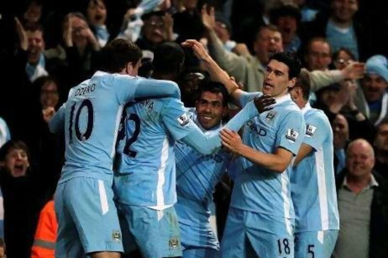 A pass from Carlos Tevez, centre, set Samir Nasri up to score Manchester City’s winner against Chelsea last week in the Premier League.