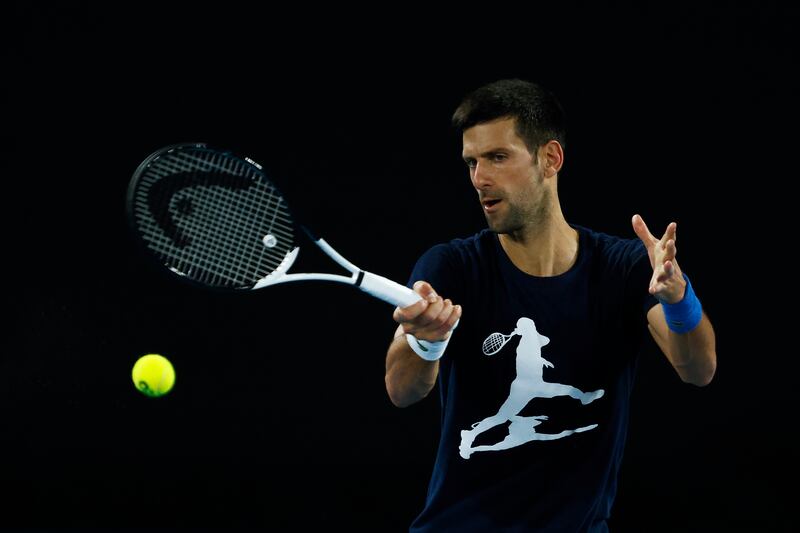 Novak Djokovic plays a forehand during a practice session ahead of the 2022 Australian Open at Melbourne Park. Getty Images