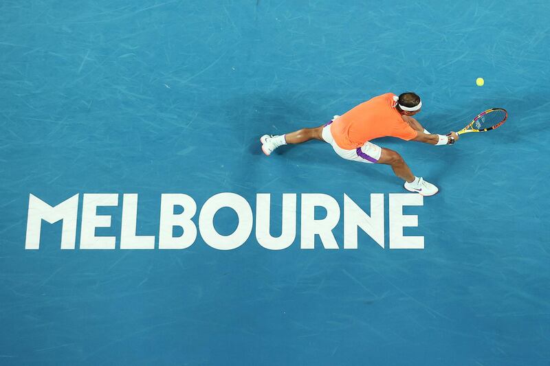 Rafael Nadal plays a backhand at Melbourne Park. Getty