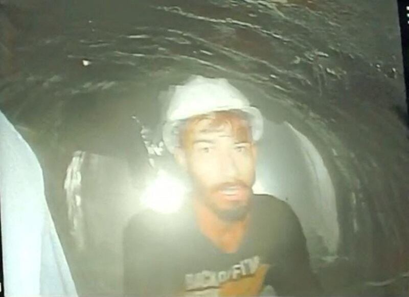A labourer trapped inside the tunnel. Reuters