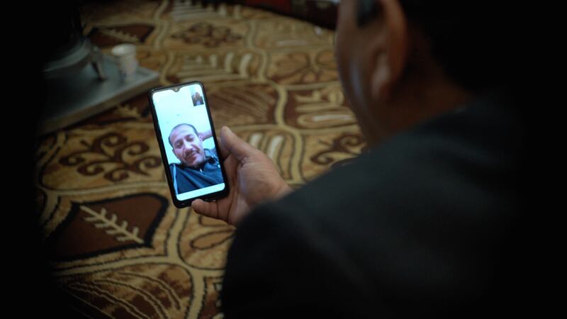 Mohammed Jomaa video calling his brother Abed in the USA. Mahmoud Rida/ The National