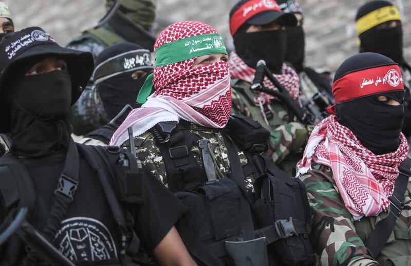 Fighters of various resistance factions take part in a press conference of the Joint Chamber of the Palestinian Resistance Factions in Gaza City.  EPA