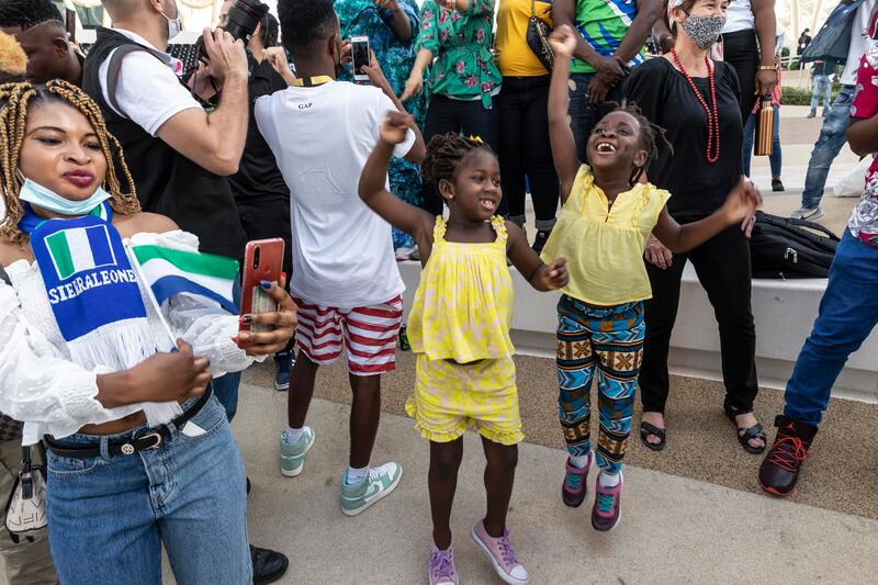 Young music fans at Al Wasl Plaza for the Sierra Leone Cultural Performance. (Photo: Antonie Robertson / The National)