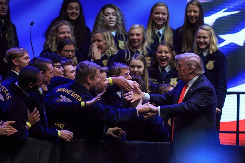 US President Donald Trump greets students before he speaks to the Future Farmers of America convention at the Banker's Life Fieldhouse in Indianapolis, Indiana, USA. Trump has been criss-crossing the country holding rallies ahead of the Mid-Term elections scheduled for November 6.  EPA