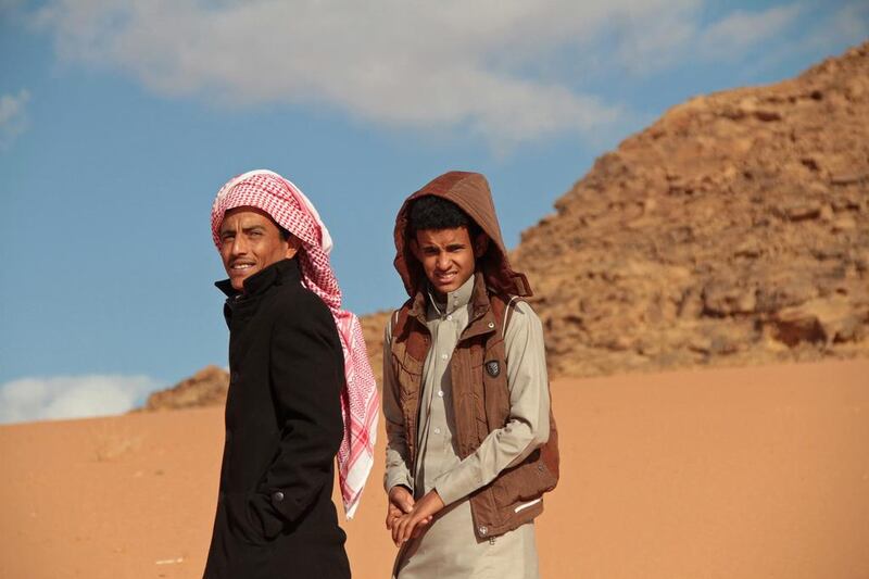 Jacir Eid Al Hwietat, right, and his cousin, Hussein Salameh Al Sweilhiyeen, who starred in Theeb. They have now have returned to their lives in the Jordanian desert but would like to continue acting. Raad Adayleh / AP Photo