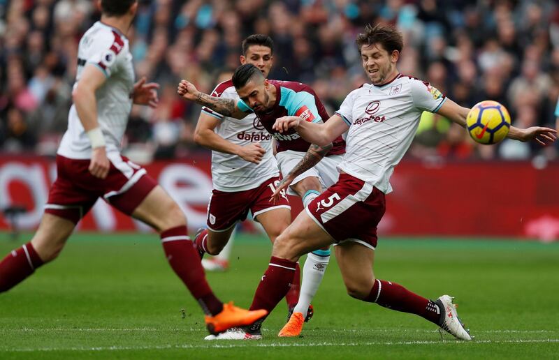 Centre-back: James Tarkowski (Burnley) – Helped Burnley hold on in a first half where West Ham was better before Chris Wood inspired a 3-0 victory. Peter Cziborra / Reuters