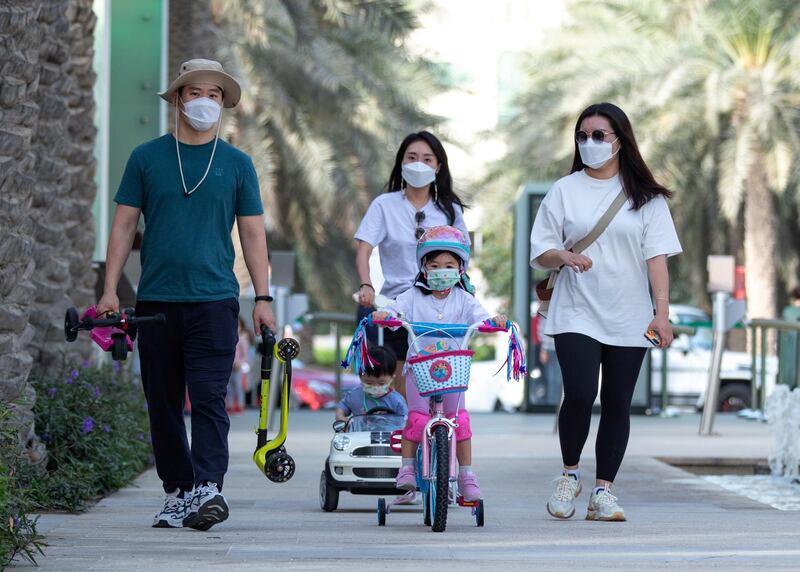 Abu Dhabi, United Arab Emirates, March 15, 2021.  Emirati Children's Day at Umm Al Emarat Park.  The Jang family from Korea.
Victor Besa/The National
Section:  NA
FOR:  Stand Alone/ Big Picture