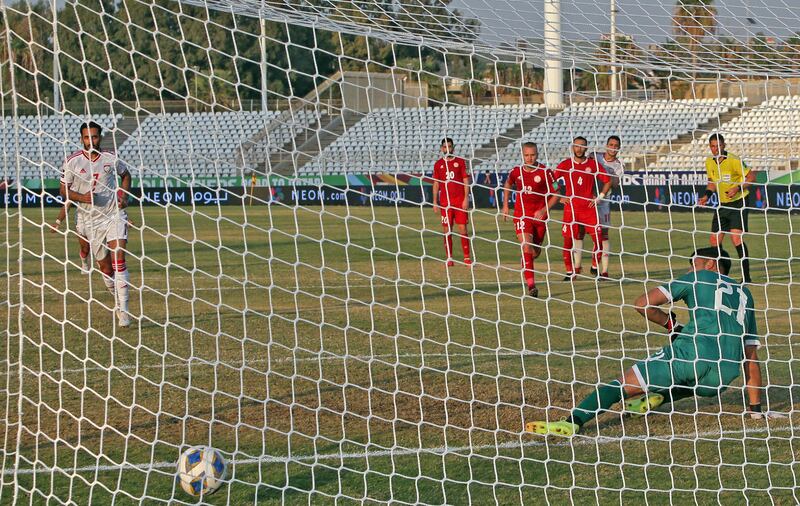 Ali Mabkhout scores UAE's winner from the penalty spot. AFP