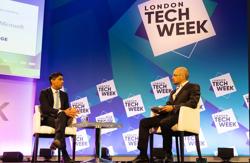 Prime Minister Rishi Sunak and Demis Hassabis speak at London Tech Week. Getty Images