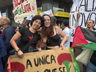 Students Carolina Gonsalves and Marianna show solidarity for Palestine at the 50th Carnation Revolution Demonstrations in Lisbon