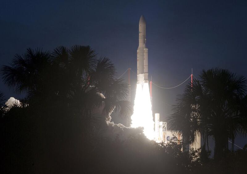 The Arianespace launch site in Kourou, French Guiana shows the launch of an Ariane 5 rocket. It successfully placed two satellites in orbit, after twice delaying the launch for technical reasons. Riyadh-based communications operator Arabsat's 4.9-tonne satellite, made by Astrium and Thales Alenia Space, separated 26 minutes and 39 seconds after the launch while the South Korean satellite separated 32 minutes later.  P Baudon /  AFP