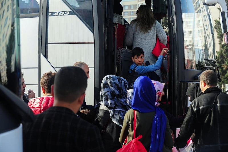  A one hundred and forty three Syrian refugees volunteered to return their homelands Jarablus,Damascus,Aleppo,A'zaz,Al Bab,Afrin load their belongings to trunks of the buses and wait for departure from Istanbul in Esenyurt Municipality garden.          EMRAH GUREL
