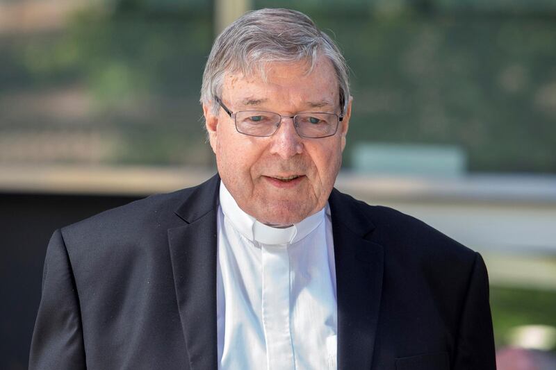 In this Dec 10, 2018, photo, Cardinal George Pell, the most senior Catholic cleric to face sex charges, departs an Australian court. Pell was sentenced in an Australian court on Wednesday, March 13, 2019 to 6 years in prison for molesting two choirboys in a Melbourne cathedral more than 20 years ago.  (AP Photo/Asanka Brendon Ratnayake)