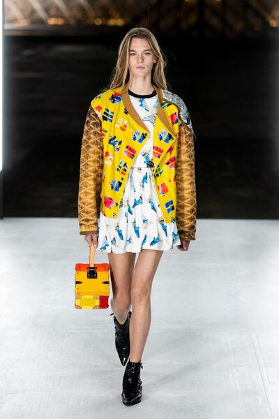 epa07064946 A model presents a creation from the Spring/Summer 2019 Women's collections by French designer Nicolas Ghesquiere for Louis Vuitton during the Paris Fashion Week, in Paris, France, 02 October 2018. The presentation of the Women's collections runs from 24 September to 02 October.  EPA/ETIENNE LAURENT