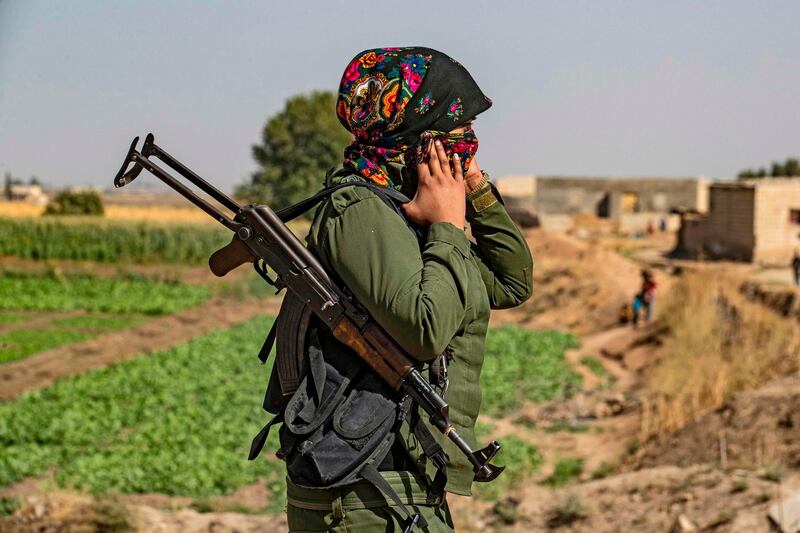 A member of the Kurdish Internal Security Forces of Asayesh stands guard. AFP