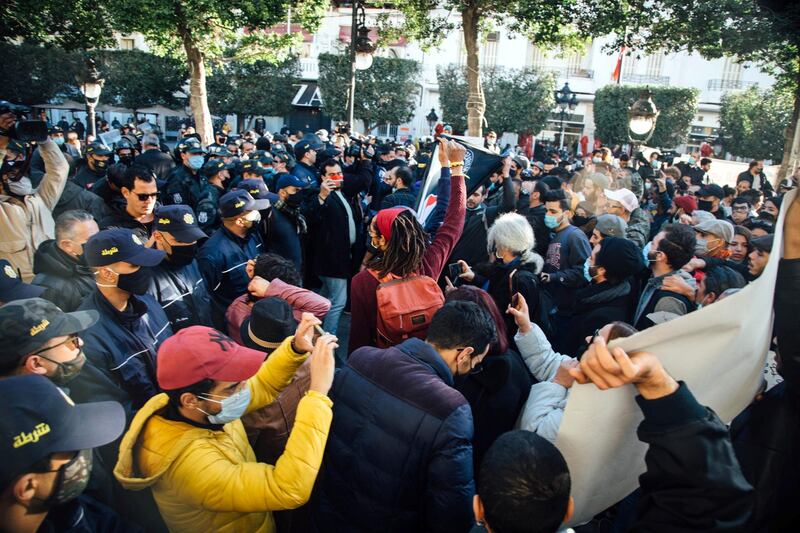 Protesters and police square off on Avenue Habib Bourguiba on Tuesday. Erin Clare Brown / The National