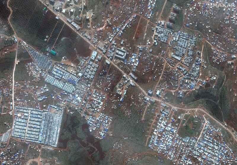 This satellite image provided by Maxar Technologies shows refugee camps for internally displaced people near Deir Hassan in northern Syria's Idlib province near the Turkish border on Feb. 16, 2020. AP