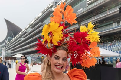 The Dubai World Cup is an opportunity for women to show off striking hats and fascinators. Antonie Robertson / The National