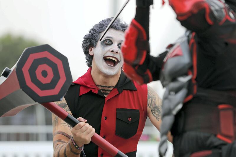 Dubai, United Arab Emirates - April 11, 2019: Visitors dress up as they visit the Middle East Film and Comic Con. Thursday the 11th of April 2019. World Trade Centre, Dubai. Chris Whiteoak / The National