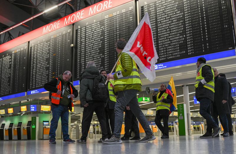 Airport workers strike at Frankfurt Airport, Germany.   Thousands of flights were cancelled across the country on Friday as workers walked out. AP