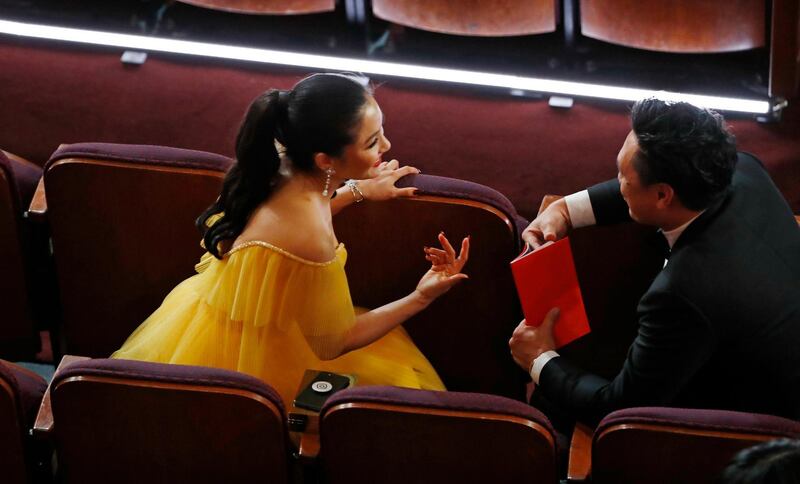 Constance Wu chats before the start of the show. Photo: Reuters