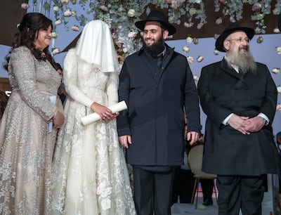 Rabbi Levi Duchman and Lea Hadad during their wedding ceremony in Abu Dhabi. All photos: Victor Besa / The National