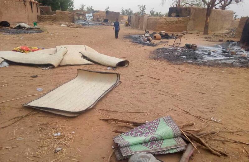 The scene shortly after a violent attack that left at least 134 people dead and dozens more wounded, which according to witnesses was carried out by the ethnic Dogon militia who descended on Ogossogou village, Mali, early Saturday March 23, 2019.  FranÃ§ois Delattre, the president of the U.N. Security Council who spoke in Mali's capital on Saturday, condemned the massacre as an "unspeakable attack." (Tabital Pulaaku via AP)