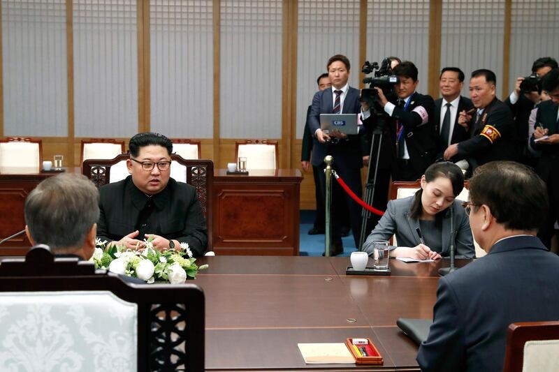 The rival delegations sit at the same table. Korea Summit Press Pool / Korea Summit Press Pool