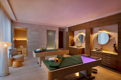 The couples' treatment room at eforea spa has a private sauna, steam bath and earth and water-themed treatment beds. Courtesy Hilton