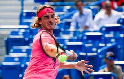 epa06950084 Stefanos Tsitsipas of Greece in action against David Goffin of Belgium in their match in the Western & Southern Open tennis tournament at the Lindner Family Tennis Center in Mason, Ohio, USA, 14 August 2018.  EPA/PHILLIP WRIGHT