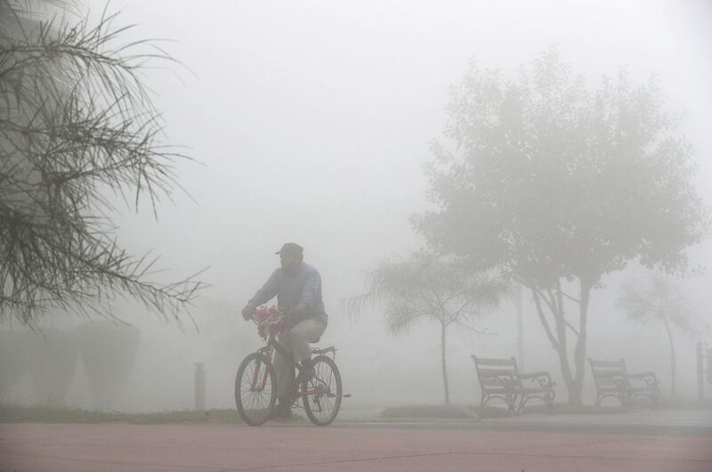 DUBAI , UNITED ARAB EMIRATES , DEC 23 – 2017 :- Early morning fog in Discovery Gardens area in Dubai.  (Pawan Singh / The National) For News