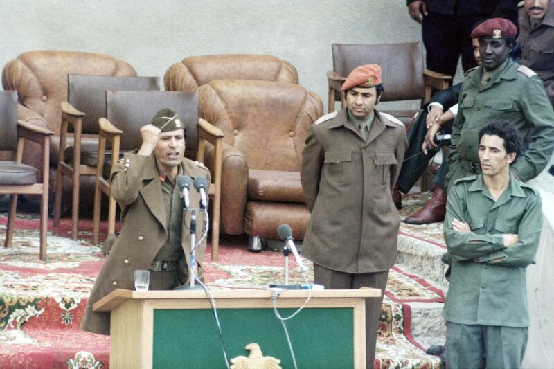 Libya’s leader Moammar Gadhafi gives a fiery speech near Tripoli, Libya in April 1977 on the formation of S.P.L.A.J., (Socialist People’s Libyan Arab Jemahiriyeh). Standing by at extreme right is Prime Minister Abdel Salam Jalloud. (AP Photo)