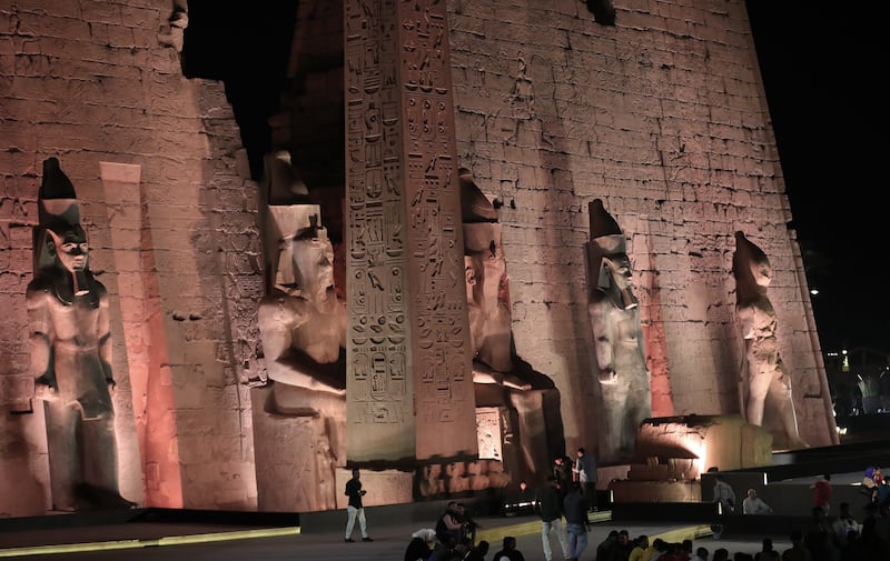 A procession of hundreds of costumed performers set out from Luxor Temple to Karnak Temple. EPA