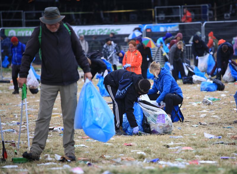 The cleaning up begins after campers and festivalgoers packed up their belongings and left in a steady stream from the Somerset site. EPA