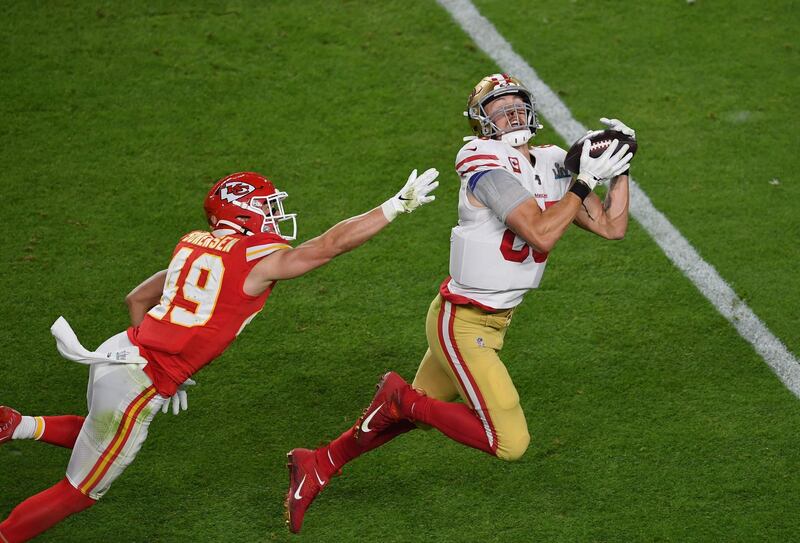 Chiefs' Daniel Sorensen tries to stop George Kittle of the 49ers. AFP