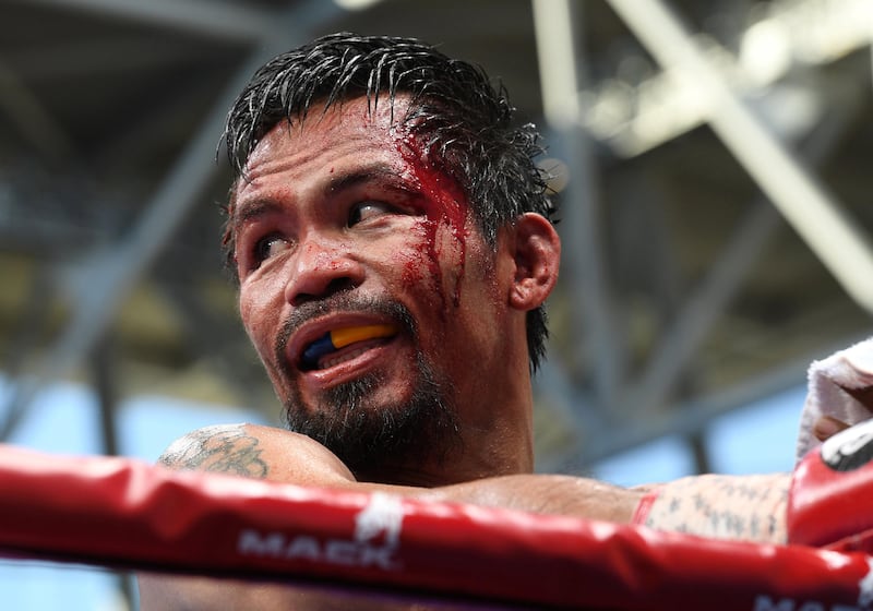 A bloodied Manny Pacquiao in his corner during his fight against Jeff Horn at Suncorp Stadium.