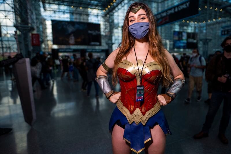 A Wonder Woman cosplayer poses during New York Comic Con. Charles Sykes / Invision / AP