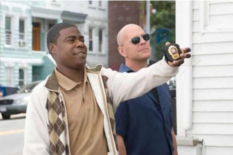 Tracy Morgan and Bruce Willis star as Paul and Jimmy, a pair of wisecracking Brooklyn police officers facing a month's suspension in the lightweight but enjoyable Kevin Smith crime caper 'Cop Out'.