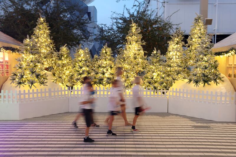 Winter City features festive decor, with a prominent white and gold theme