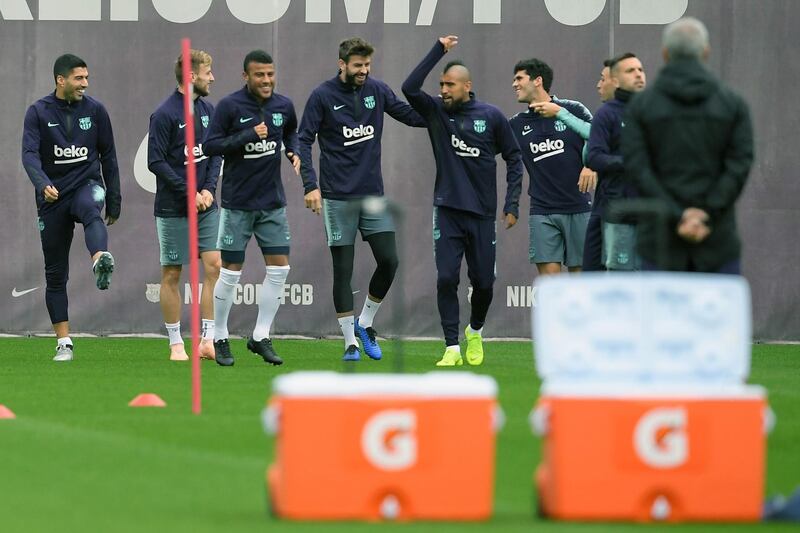 Barcelona attend a training session on the eve of Sunday's Primera Liga game against arch-rivals Real Madrid, an encounter called 'El Clasico'. AFP