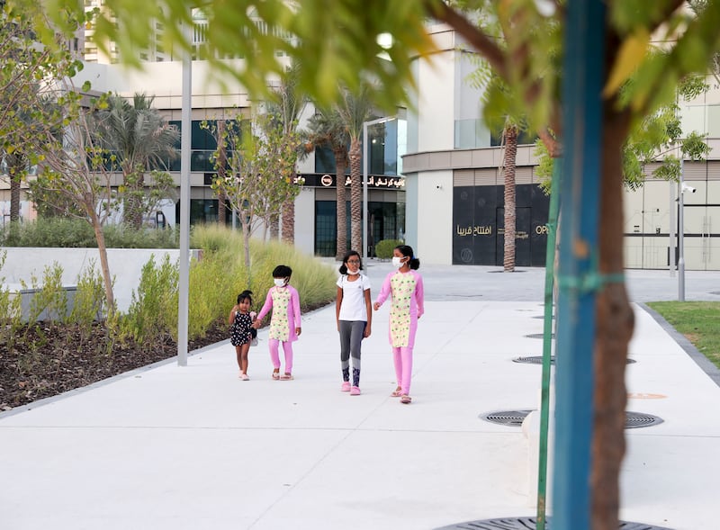 An evening stroll at Sheikha Fatima bint Mubarak park in Khalidiya.