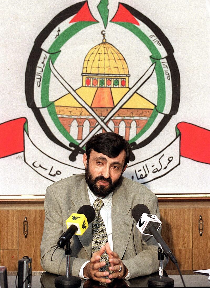 (FILES) This file photo taken on September 23, 1999 shows Hamas member, Imad al-Alami, talking to journalists at a press conference held in the southern suburbs of Beirut. 
Alami, a senior Hamas figure, was shot in the head in Gaza and hospitalised in critical condition on January 9, 2018 in what officials said was an accident. Hamas spokesman Fawzy Barhoum said in a statement Imad al-Alami, a former member of Hamas's highest political body, was shot while "inspecting his personal weapon in his home and is in critical condition".
 / AFP PHOTO / JOSEPH BARRAK