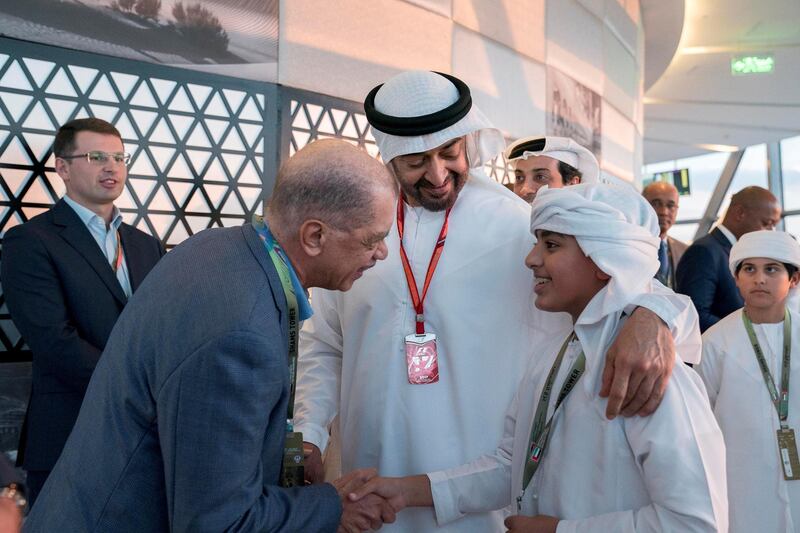 YAS ISLAND, ABU DHABI, UNITED ARAB EMIRATES - November 26, 2017: HH Sheikh Mohamed bin Zayed Al Nahyan Crown Prince of Abu Dhabi Deputy Supreme Commander of the UAE Armed Forces (2nd R), HH Sheikh Zayed bin Mohamed bin Hamad bin Tahnoon Al Nahyan (R) and HE James Alix Michel, former President of Seychelles (3rd R), attend the final day of  Formula 1 Etihad Airways Abu Dhabi Grand Prix. Seen with HH Sheikh Mohamed bin Mansour bin Zayed Al Nahyan (back R).
( Mohamed Al Hammadi / Crown Prince Court - Abu Dhabi )
---