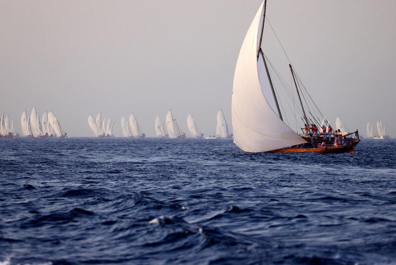 Emirati competitors sail their dhows as they take part in the Dalma Sailing Festival in 60 foot sailing boats in the waters of Dalma island in the Gulf, off of the Emirati capital Abu Dhabi, on May 20 2021. (Photo by Karim SAHIB / AFP)