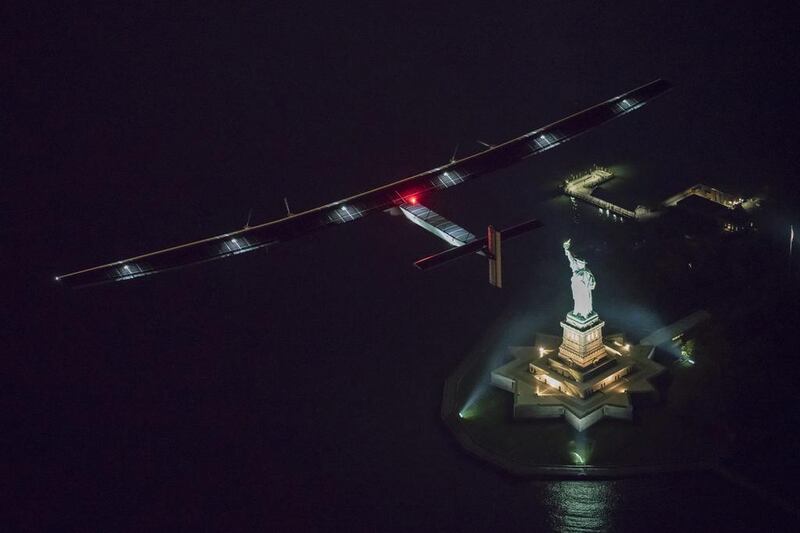 'Solar Impulse 2'  flies over the Statue of Liberty in New York shortly before landing at John F Kennedy International Airport on June 11, 2016. The 265-kilometre flight from Lehigh Valley International Airport in Pennsylvania took four hours 40 minutes.