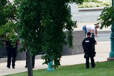 Suspect Floyd Ray Roseberry apprehended after being in a pickup truck parked on the sidewalk in front of the Library of Congress, as seen from a window of the US Capitol, on August 19, 2021, in Washington.  AP